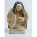 A Japanese Carved Ivory Netsuke