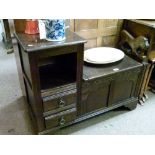 Reproduction dark oak telephone table, the box seat having hinged cover