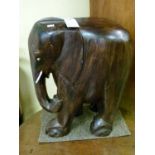 Modern carved and stained wooden elephant shaped stool