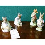 Three Beswick Beatrice Potter figures comprising: Samuel Whiskers, Hunca Munca Sweeping and Poorly