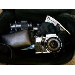 Praktica MTL3 35mm camera together with two lenses etc