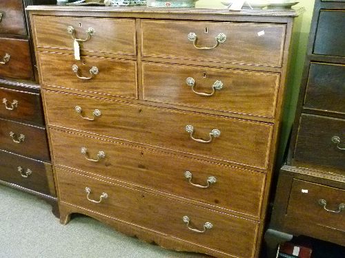 Late 19th/early 20th Century mahogany and satinwood crossbanded chest of four short over three