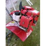 Petrol driven garden tiller