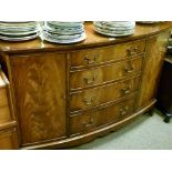 Reproduction mahogany bowfront sideboard fitted four long drawers flanked each side by door on