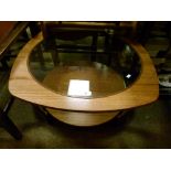 G Plan style teak square two tier coffee table having circular glass inset top