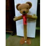 Merrythought teddy bear child's clothes stand formed as a teddy bear's head and outswept arms on a