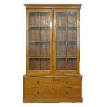 19th Century pine sided oak two section library bookcase, the upper section fitted four shelves