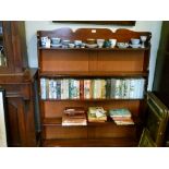 Late 19th Century mahogany waterfall bookcase fitted four shelves having shaped crest