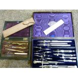 Two vintage drawing sets, cased