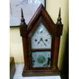 Late 19th Century American rosewood veneered lancet clock having painted dial and transfer printed