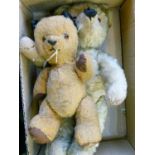 Vintage blonde plush teddy bear together with a vintage Sooty soft toy