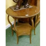 Edwardian mahogany circular occasional table, raised on six cabriole supports united by under tier