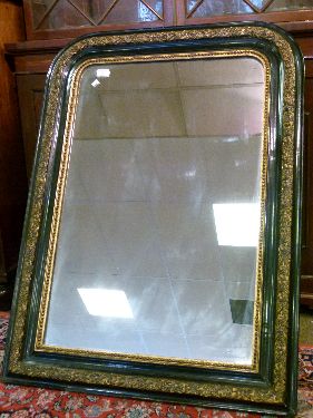 Late Victorian gilt and ebonised framed pier glass having moulded foliate decoration