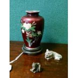 Japanese cloisonné vase having foliate decoration on a red ground together with a miniature white