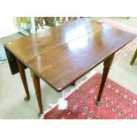 George III mahogany rectangular two flap tea table standing on tapered pad supports