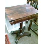 Small Victorian rosewood rectangular top fold-over games table, the top opening to reveal an