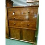 19th Century mahogany linen press of inverted design, the upper section fitted two short over two