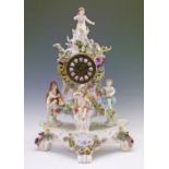Meissen 'Four Seasons' mantel clock and stand, late 19th/early 20th Century, having typical
