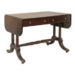 George IV mahogany two flap sofa table having a reeded edge, fitted two real and two dummy drawers