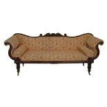 Regency carved rosewood framed double scroll end sofa standing on tapered turned and reeded