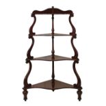 Victorian mahogany corner what-not fitted four graduated shelves supported by scroll pillars and