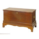 19th Century mahogany blanket box fitted heavy brass carrying handles and standing on bracket
