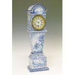 Late 19th Century Continental faience cased timepiece in the form of a longcase clock, having