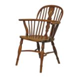 19th Century yew and elm Nottinghamshire low splat back Windsor elbow chair by George Nicholson of