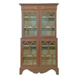 19th Century stained pine two section cabinet bookcase, the upper section fitted three shelves