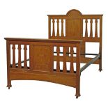 Liberty style Arts & Crafts light oak 4'6" double bedstead having shaped laths and Art Nouveau