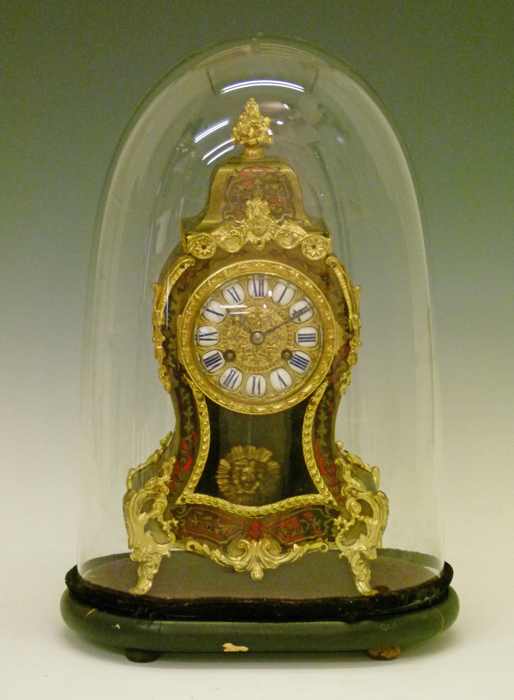 19th Century French ormolu mounted buhl and red tortoiseshell cased mantel clock, the dial with blue