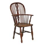 19th Century yew, ash and elm low hoop back Windsor elbow chair standing on turned supports united