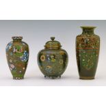 Japanese cloisonnÚ baluster vase decorated with lappet shaped reserve panels, each with a bird or