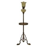 Late 19th/early 20th Century brass floor standing oil lamp having a reeded column with galleried
