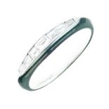 Diamond  half hoop ring, stamped '10% Irid Plat', set with a line of seven graduated baguette