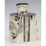 Chinese white metal kidney shaped tea caddy and cover having prunus decoration in relief, maker Hung