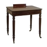 Attributed to Gillows - Regency mahogany chamber writing table, the rounded rectangular top having a