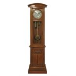 Early 20th Century light oak longcase clock having Secessionist style carved foliate decoration, the