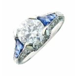 Art Deco style diamond and calibrÚ sapphire ring, the brilliant cut of 1.2 carat, between