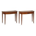 Pair of George III satinwood rectangular bowfront fold over card tables, each having rosewood