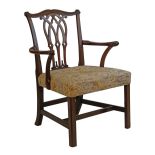 George III Chippendale style mahogany open arm elbow chair, the crest rail with carved corners,