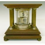 Early 20th Century mahogany and nickel plated portico cased flick clock, 16.5cm high  Condition: