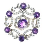 Edwardian diamond and amethyst pendant brooch, the circular wreath border of old single cut diamonds