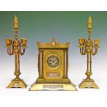 19th Century ormolu and lilac jasperware garniture de cheminee, the clock having a splayed tray