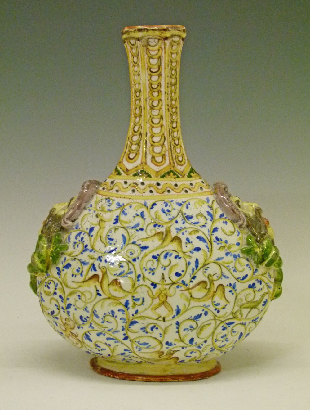 Italian majolica Pilgrim flask decorated with figures, birds and animals amongst scrolling foliage