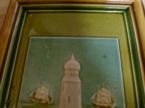 19th Century rectangular pottery tile plaque decorated with a shield showing a lighthouse with two - Image 2 of 5