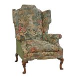 Georgian style wing back drawing room chair upholstered in floral and landscape patterned
