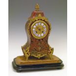 19th Century French boulle cased mantel clock, having cast ormolu mounts, gilt dial having blue