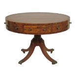 George IV mahogany drum table, having an inset tooled leather top, the real and dummy drawers with