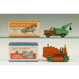 Dinky die-cast - Breakdown Lorry (25x) together with Heavy Tractor (563), both boxed  Condition: